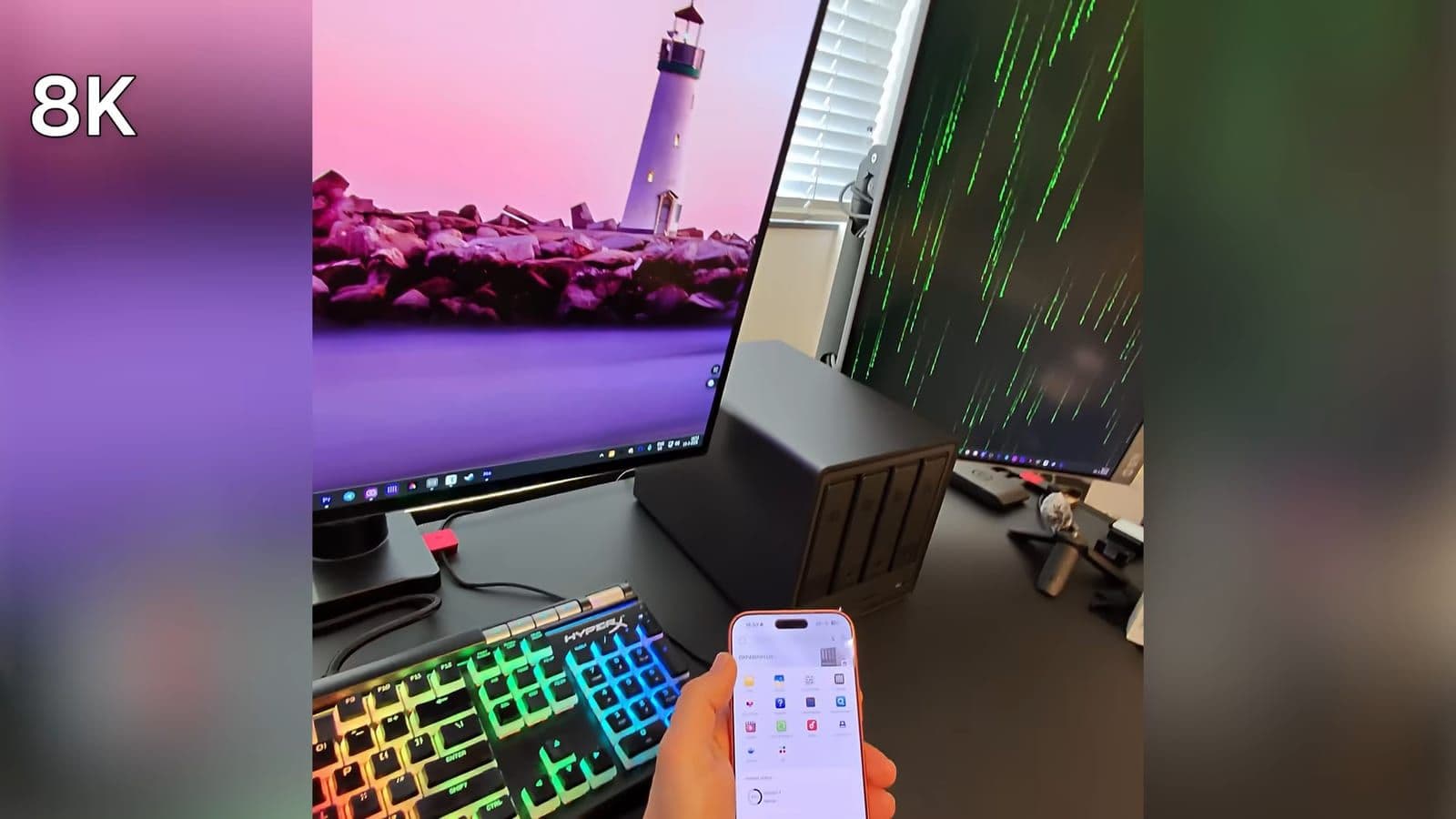 A smartphone running the UGREEN mobile application setup wizard in front of the desktop setup